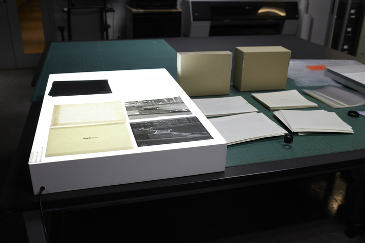 NEDCCInfo's tweet image. #Historicalcollections house an abundance of photographic negatives! Associate Collections Photographer Harrison Walker recently rehoused 844 polyester interpositives—positive images of negatives—depicting street scenes for a municipal archive. #WorkstationWednesday