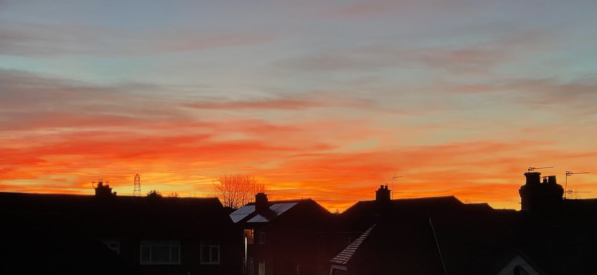 Another #sunsetpic! This evening’s Autumnal view, subject to limitations of my loft skylight &amp; the chimney stack being a bit in the way🌅 #sunset #sunsets #autumnsunset #nofilter