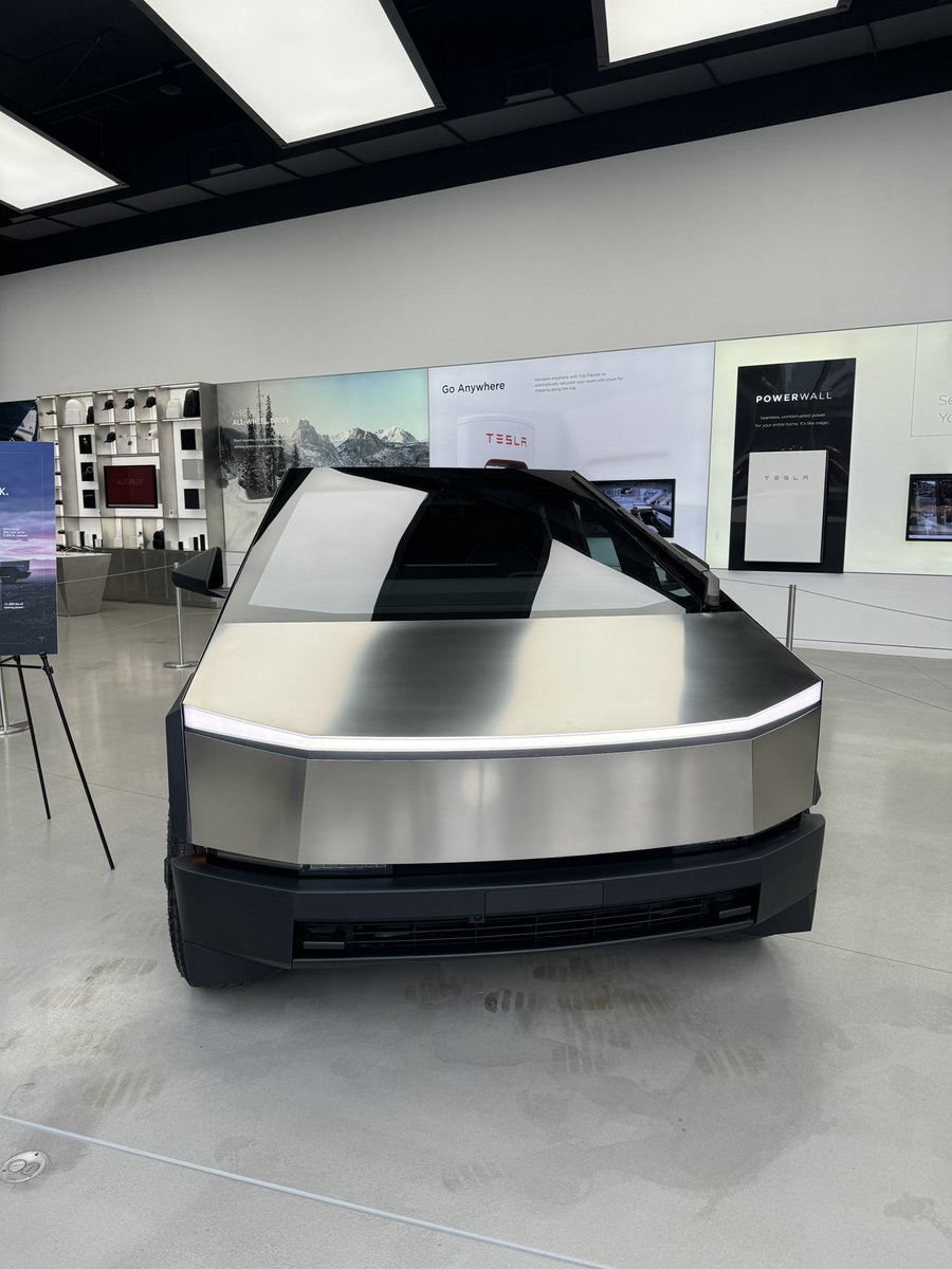 Lucky me. Came into NYC yesterday evening for a six day trip and Tesla just put the Cybertruck in their NYC store‘s showroom. Photos can’t tell how huge this thing is.
