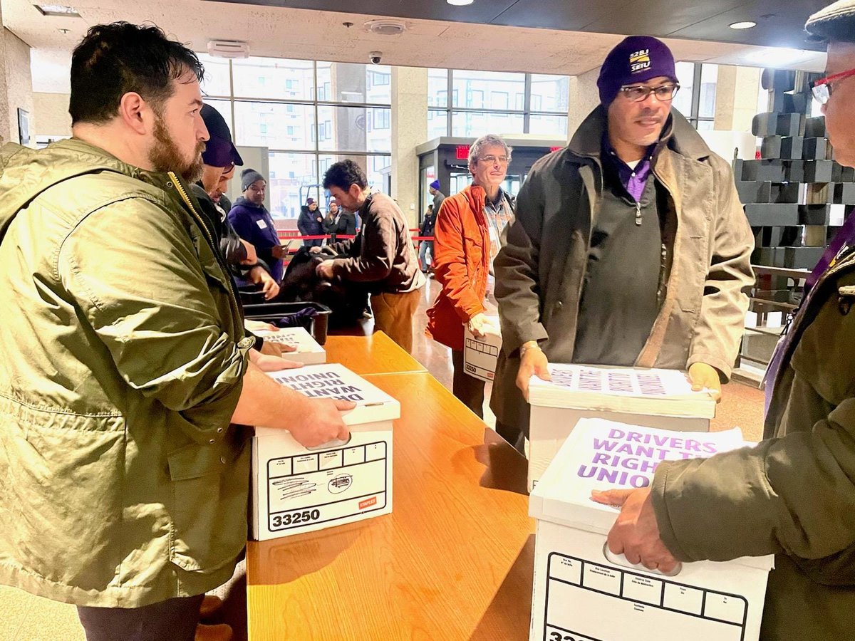 Happening NOW: Massachusetts <a href="/Uber/">Uber</a> &amp; <a href="/lyft/">Lyft</a> drivers are delivering boxes full of signatures to <a href="/SecretaryOfMass/">Mass Secretary of State</a> &amp; celebrating a milestone for drivers' ballot question for 2024. We're proud voters will have the opportunity to weigh in on drivers' ability to unionize! #mapoli