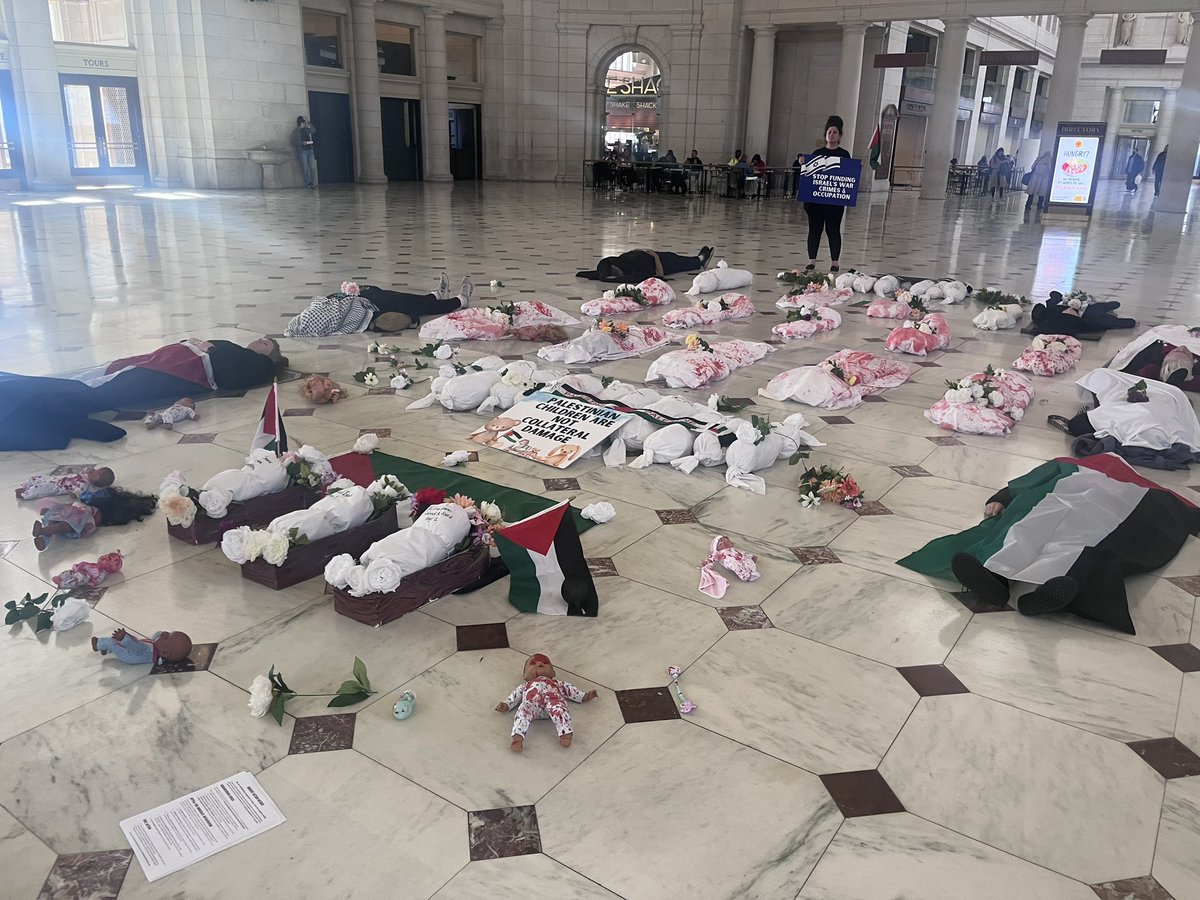 anyaparampil's tweet photo. Powerful display at Washington DC’s Union Station protesting the ongoing slaughter of Palestinian children

Some refuse to allow the power players of the Acela Corridor to forget the blood on their hands https://t.co/7xyJbUzRa4