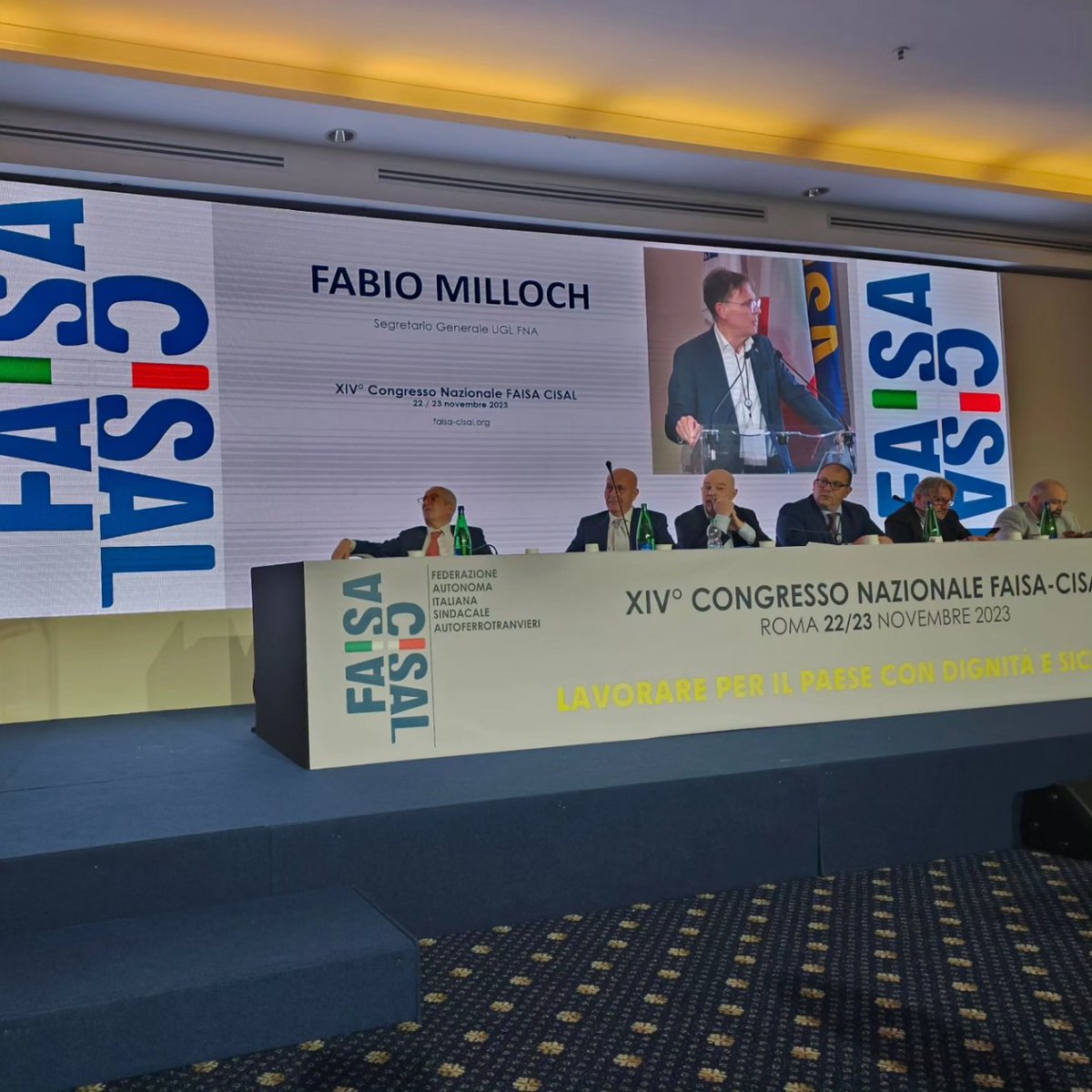 Autoferrotranvieri (@autoferro_ugl) on Twitter photo Il #Segretarionazionale <a href="/FmMilloch/">Seg. Naz. Ugl-Fna</a> interviene al #CongressoNazionale #FaisaCisal. Necessita' di azioni forti a tutela della categoria degli #autoferrotranvieri, #coraggio e #determinazione sul tavolo del #rinnovo del #contrattonazionale, per la #dignita' dell'intero settore. Il #Segretarionazionale <a href="/FmMilloch/">Seg. Naz. Ugl-Fna</a> interviene al #CongressoNazionale #FaisaCisal. Necessita' di azioni forti a tutela della categoria degli #autoferrotranvieri, #coraggio e #determinazione sul tavolo del #rinnovo del #contrattonazionale, per la #dignita' dell'intero settore.