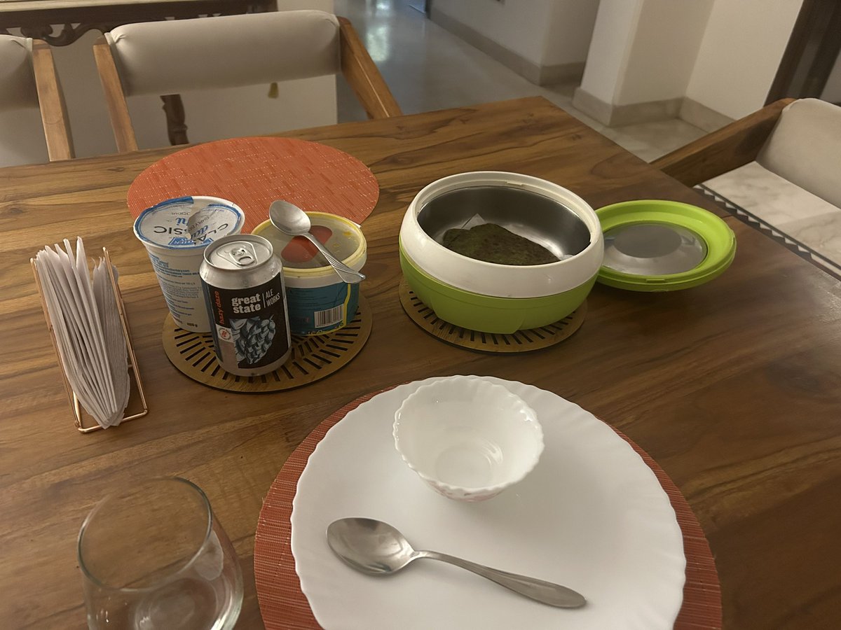 DeepPuns's tweet image. My cook saw me have a canned drink (kombucha) with breakfast yesterday so the natural step for her today, was to serve a meethi paratha with an IPA beer.