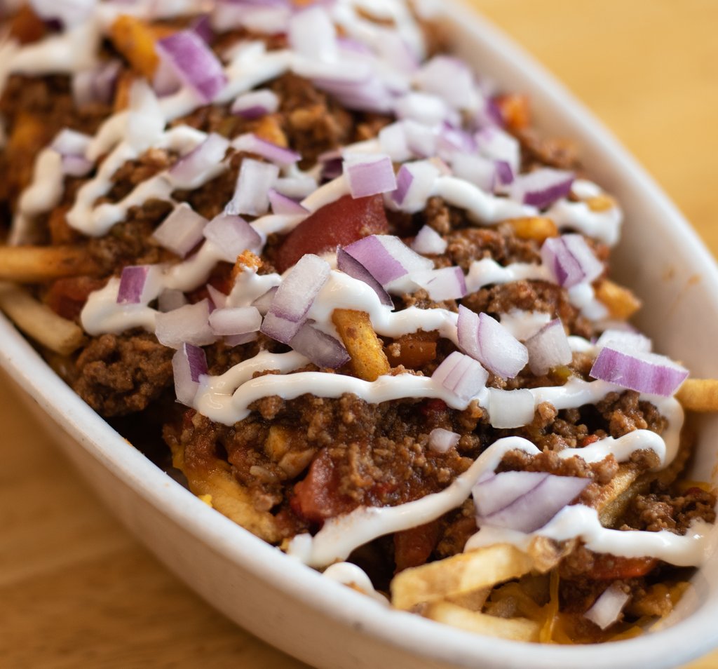 Our famous chili on shoestring fries? Say less.