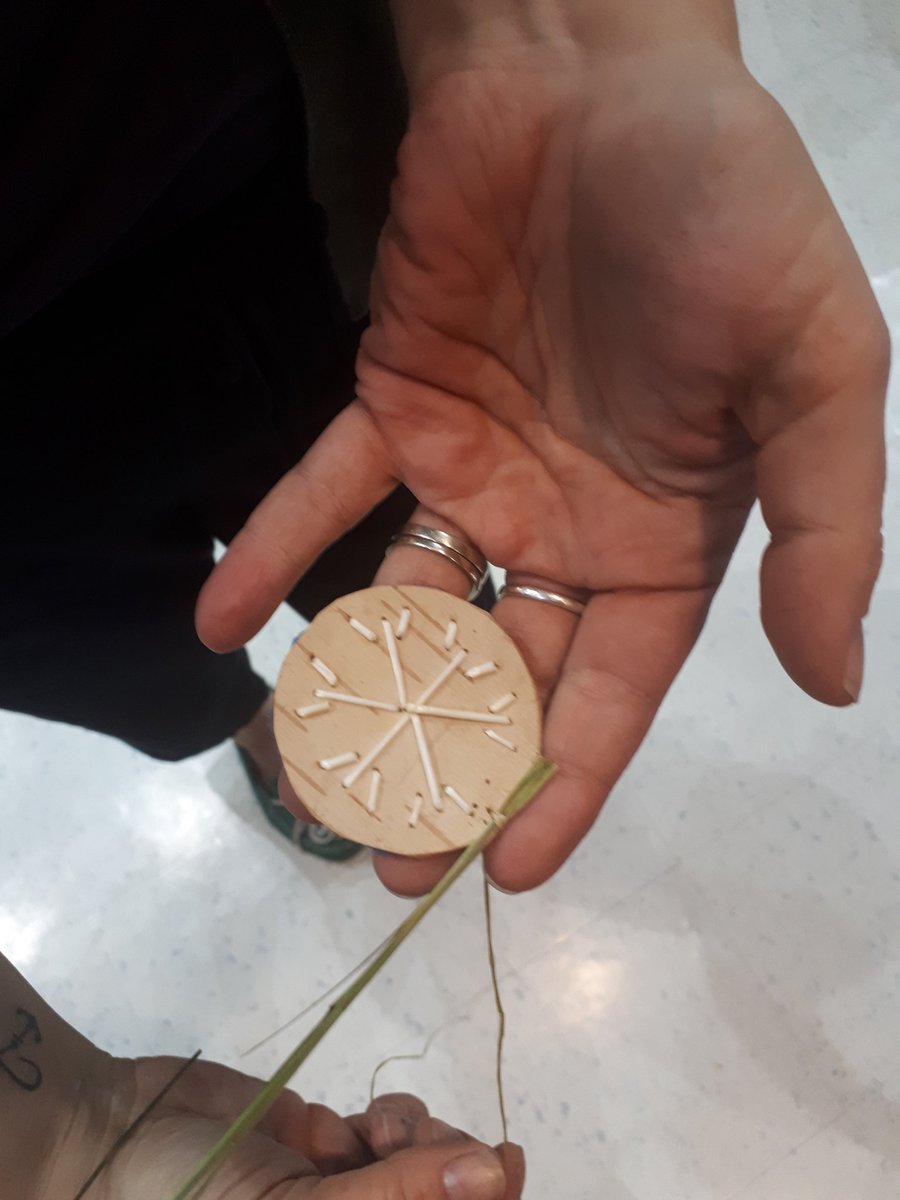 Teachers in <a href="/ASD_South/">Anglophone South School District ASD-S</a> attending a supper seminar with Mi'kmaw artist Tara Francis where teachers learned about and created porcuipine quill medallions.