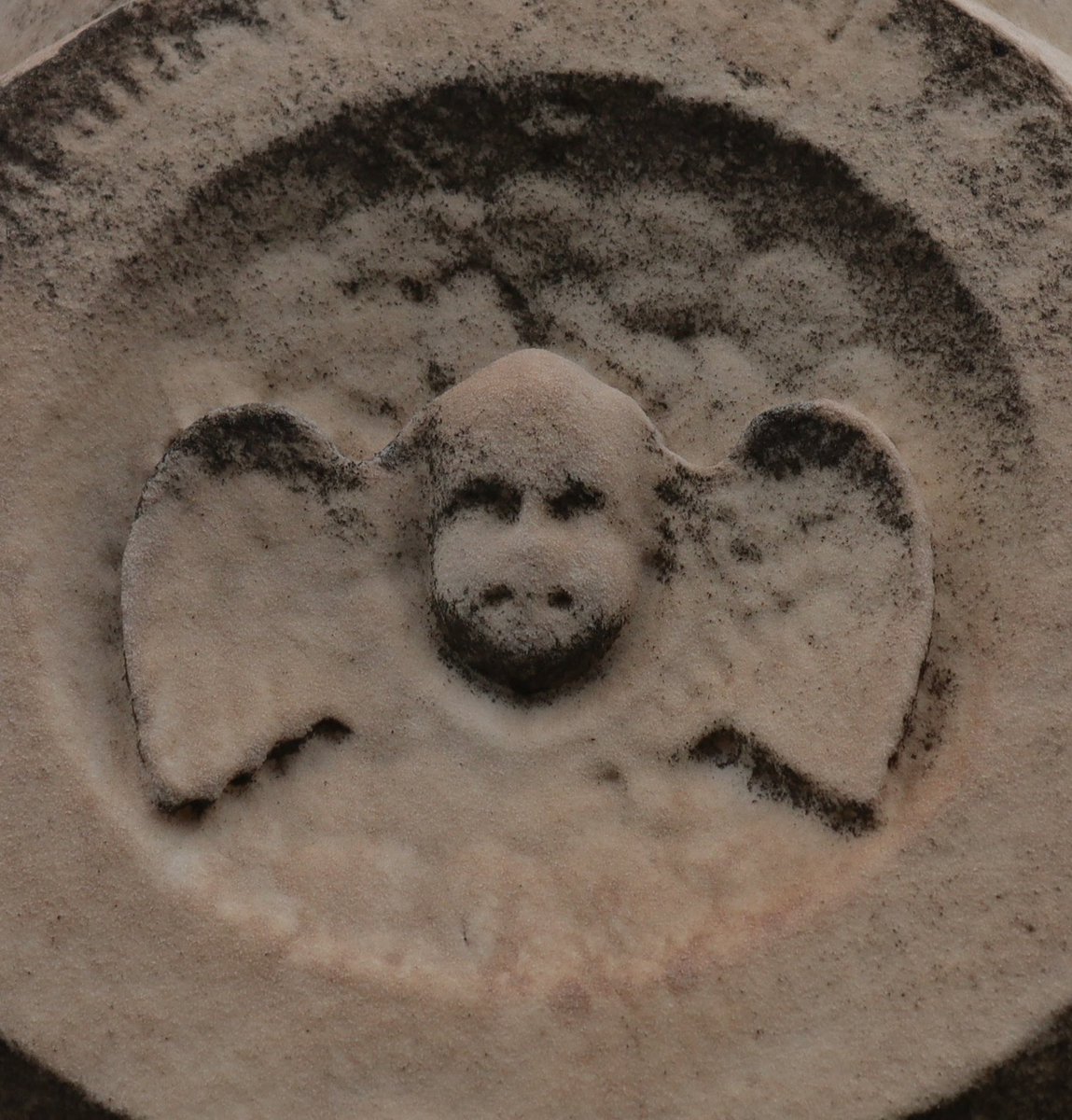 Cemetery art: 

A soul wings its way to Heaven.