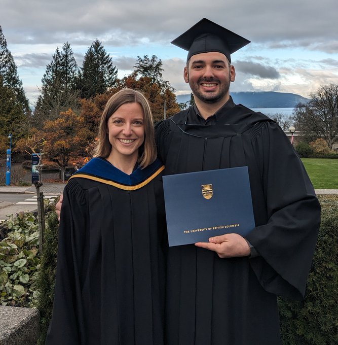 Photo of Keegan and Giuliano at UBC Bioinformatics Graduation ceremony, with mountains in the background