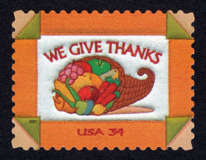 #HappyThanksgiving! This 2001 stamp features a quilt-like design by artist Margaret Cusack of New York features machine-appliqued needlework and depicts an overflowing cornucopia. ©USPS. All rights reserved.