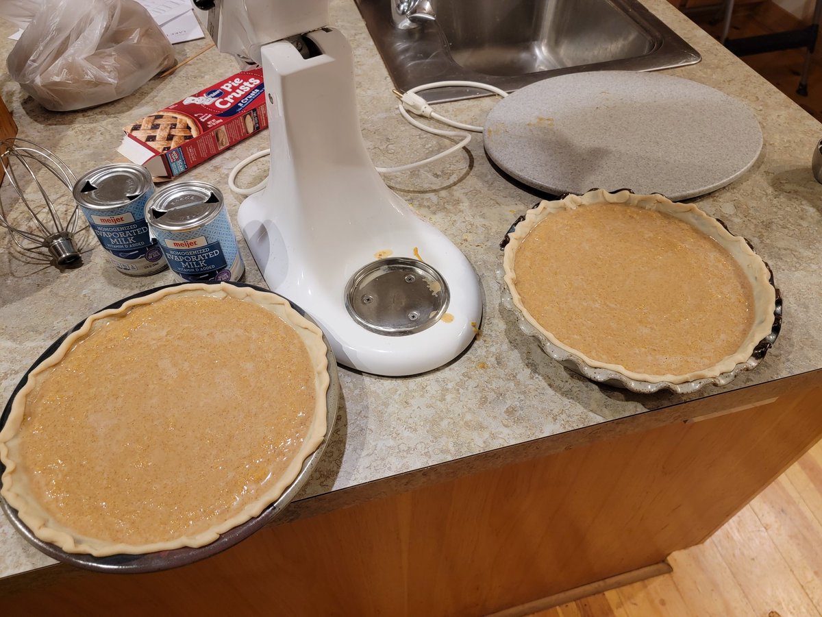 ralphrez's tweet image. Pumpkin pies ready to go in the oven