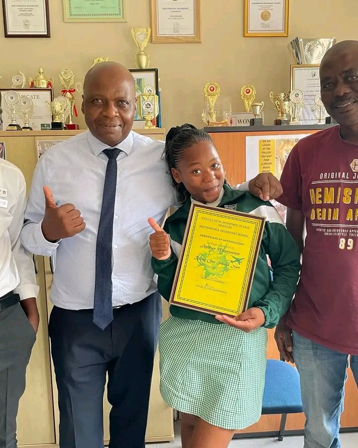 Chris Brown really changed Aphiwe Naledi's life she even recieved Icon Certificate at her school.. That a win!