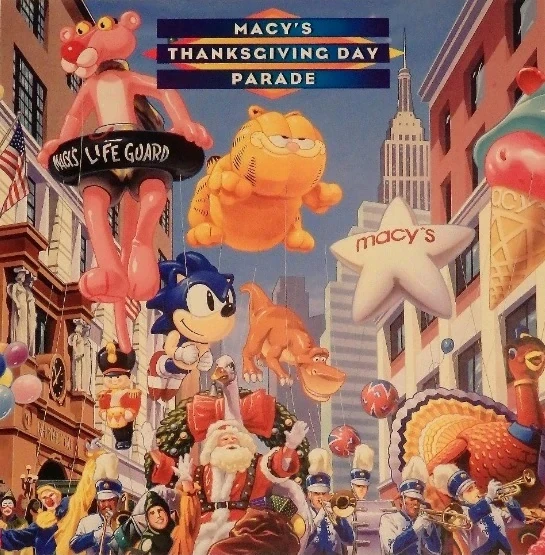 semifreqsonic's tweet photo. Thanks to artwork promoting the Macy's Thanksgiving Parade through the years, Sonic the Hedgehog has crossed over with various characters such as Garfield, Spider-Man, Barney the Dinosaur, and Betty Boop. https://t.co/WT35gtyF9L
