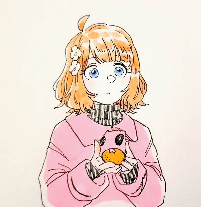 これはみかんを持ってる桃子ちゃんです