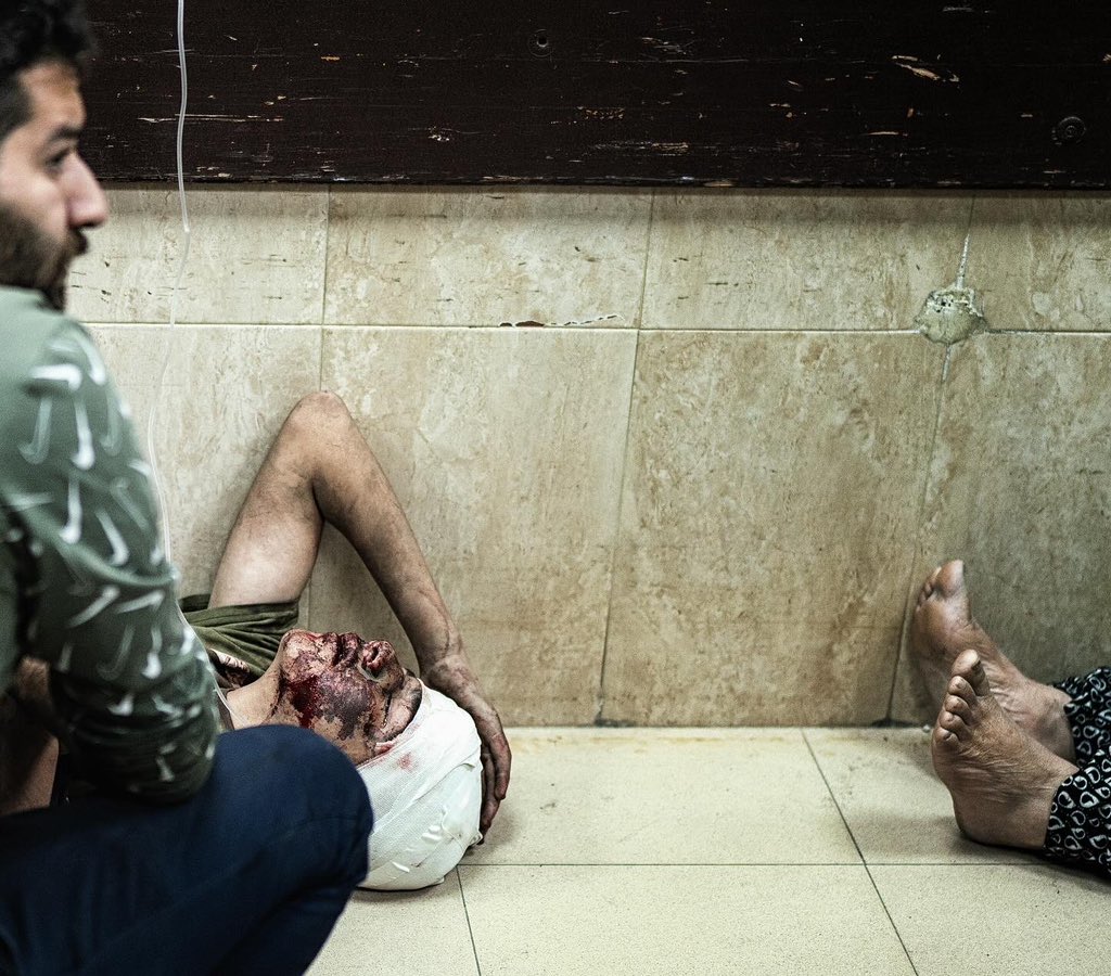 motazazaiza9's tweet photo. With the lack of space, medical staff and beds inside the emergency rooms in Gaza strip hospitals 

Hundreds of injured people arrived to the middle area hospital since the last night as the Israeli airstrikes didn’t stop. https://t.co/onPehFMQop
