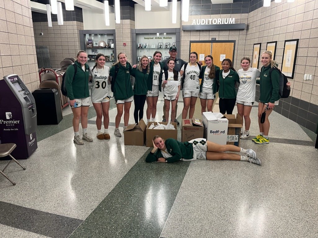 Happy Thanksgiving to all! Our team collected donations to give to the  Dubuque Food Pantry at our game on Friday. Thank you to all the volunteer parents and everyone who gave a donation! Happy Thanksgiving from the Mustangs!