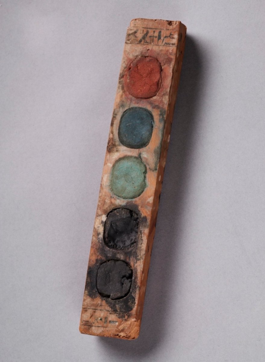 Wow, a 3,400 year-old ancient Egyptian paint box containing its original pigments!

(Looks similar to a modern-day set!)

The preserved cake pigments are red (red ochre), blue (Egyptian blue), green (a mixture of Egyptian blue, yellow ochre, and orpiment) and two of black (carbon