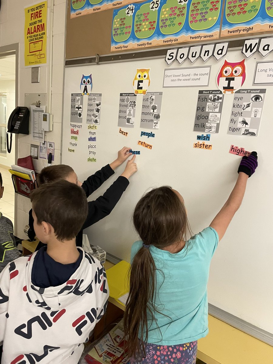 Taking messy action to build our sound wall off of vowel sounds. Great working together to all our Grade 3s! @mrsdysselhof @StJoesActon