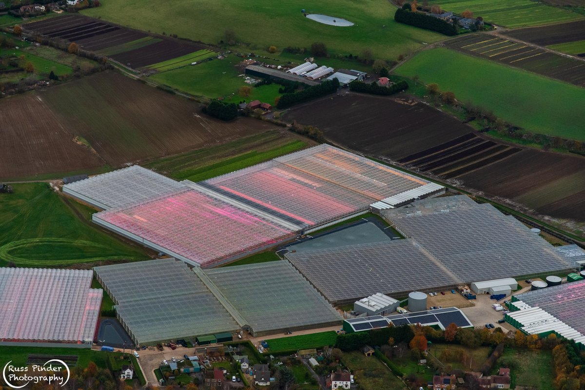 RussPinder's tweet photo. Warming up the countryside - Evesham Glasshouses #Evesham #globalwarming #aerialphoto #aerialphotography #worcestershire https://t.co/sAtx5zCgL1