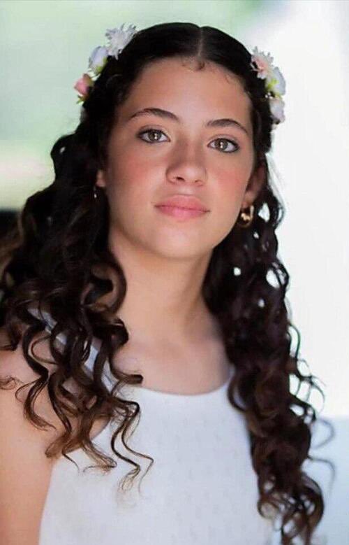 HenMazzig's tweet photo. Dafna Elyakim is only 14, being held captive by Hamas with her little sister Ella. Her father slaughtered, and she was there when it happened. 

Her father's partner’s son was forced at gunpoint to lure more children out of their homes for Hamas to kill them.

He was eventually slaughtered by Hamas as well. 

Everything has been taken from her, she's seen things no one should ever see, and she is now surrounded by strange, grown men who have no regard for her safety.

We need her home now.