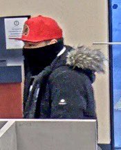 edmontonpolice's tweet photo. The Edmonton Police Service is seeking the public's assistance to identify a suspect in an armed bank robbery in northwest Edmonton.

On Nov. 8, 2023, at 4:35 p.m., a male entered the Servus Credit Union in the area of 112 Avenue and 124 Street. The suspect approached a teller, demanded money and produced a knife. After exiting the bank with the stolen cash, the suspect then fled westbound on a bicycle. There were no injuries reported during the robbery.

The robbery was captured on the bank’s video surveillance system, and police are releasing the video and images of the suspect in the hopes that someone will be able to identify him. He is described as an Indigenous male between 20 and 40 years old, standing 5’8” to 6’ tall with an average build. He was wearing black gloves, a black winter jacket with fur trim around the hood, a FC (Football Club) Edmonton black jacket or vest, jeans, a red ball cap and black shoes. The suspect wore a black mask throughout the robbery.

https://t.co/WhAEwowWIB