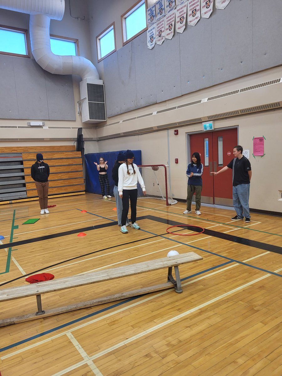 MrHollandBMHS's tweet photo. Students were having fun practicing their communication skills as they guided blindfolded partners through a "mine field" set up in the gym this morning. #BMHS #TCRCE #Communication #watchuslearn https://t.co/pOi1VLuFZP