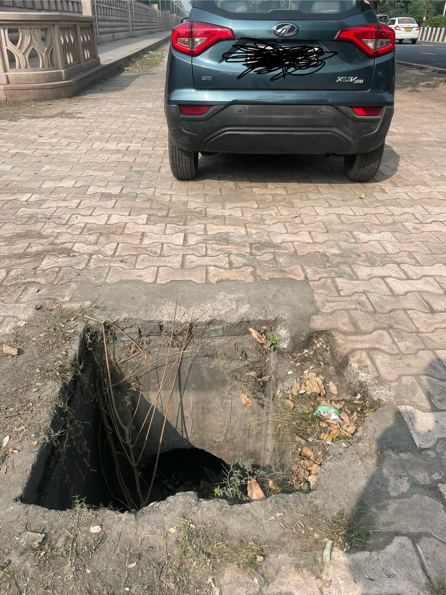 This open hole at the gate of Dalit prerana sthal ( 2nd last gate from DND Side ) is too dangerous. Please ensure to get it covered to avoid any mis happening there . 

<a href="/noida_authority/">NOIDA Authority</a>