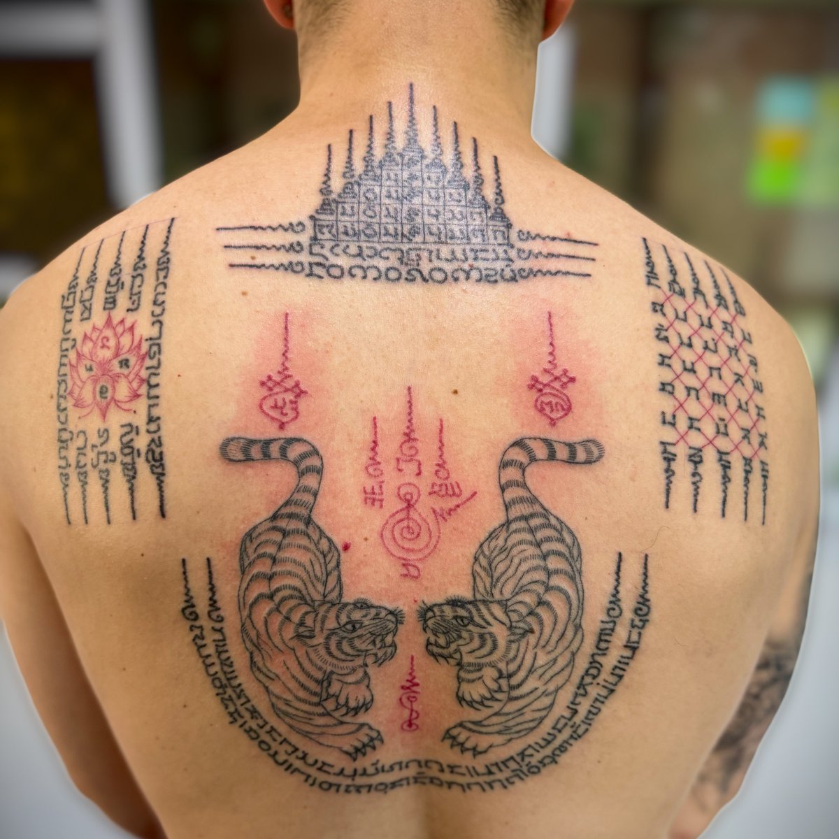 FalXIV's tweet photo. The year of the tattoos for me. 🥰
Featuring my Sak Yant from our recent trip to Thailand. https://t.co/eAIgineNSO