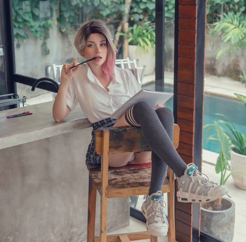 Just a ballerina doing some notes, of something that she researched before. Don’t mind the way she’s sitting and relaxing as well. Don’t disturb her now or tell her to spread her legs.