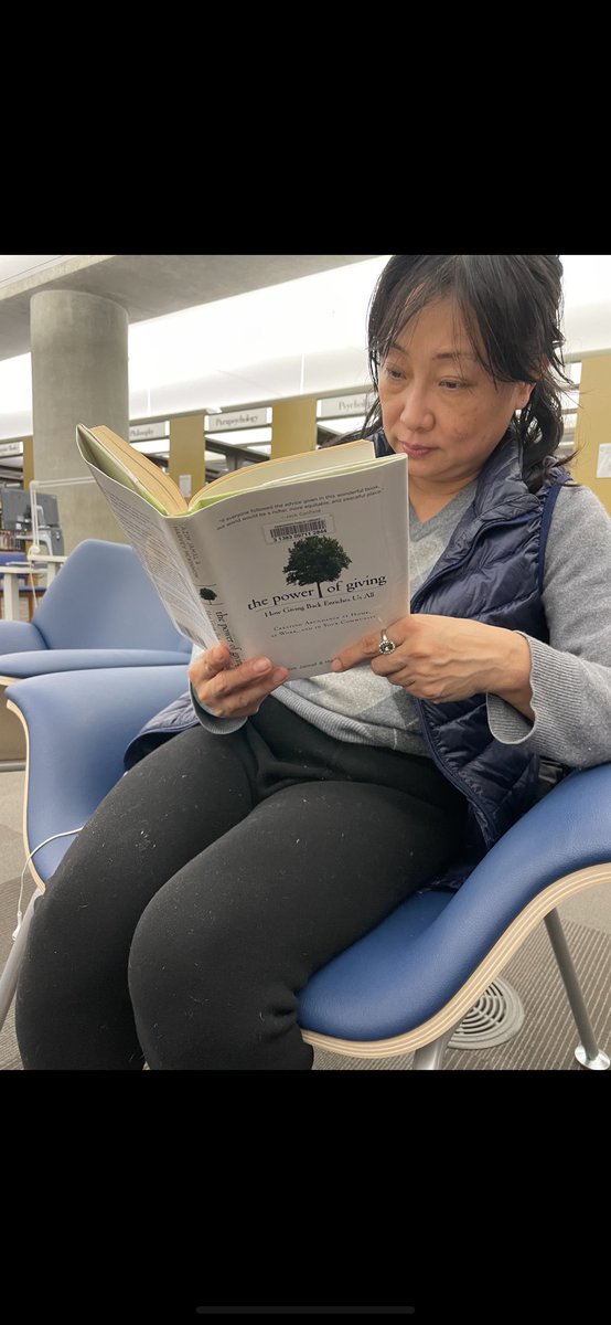 harveymckinnon's tweet photo. Photo surprise. A Vancouver, public library patron reading our Power of Giving book today ⁦@VPL⁩ . #AzimJamal https://t.co/5Mk63DFpQH