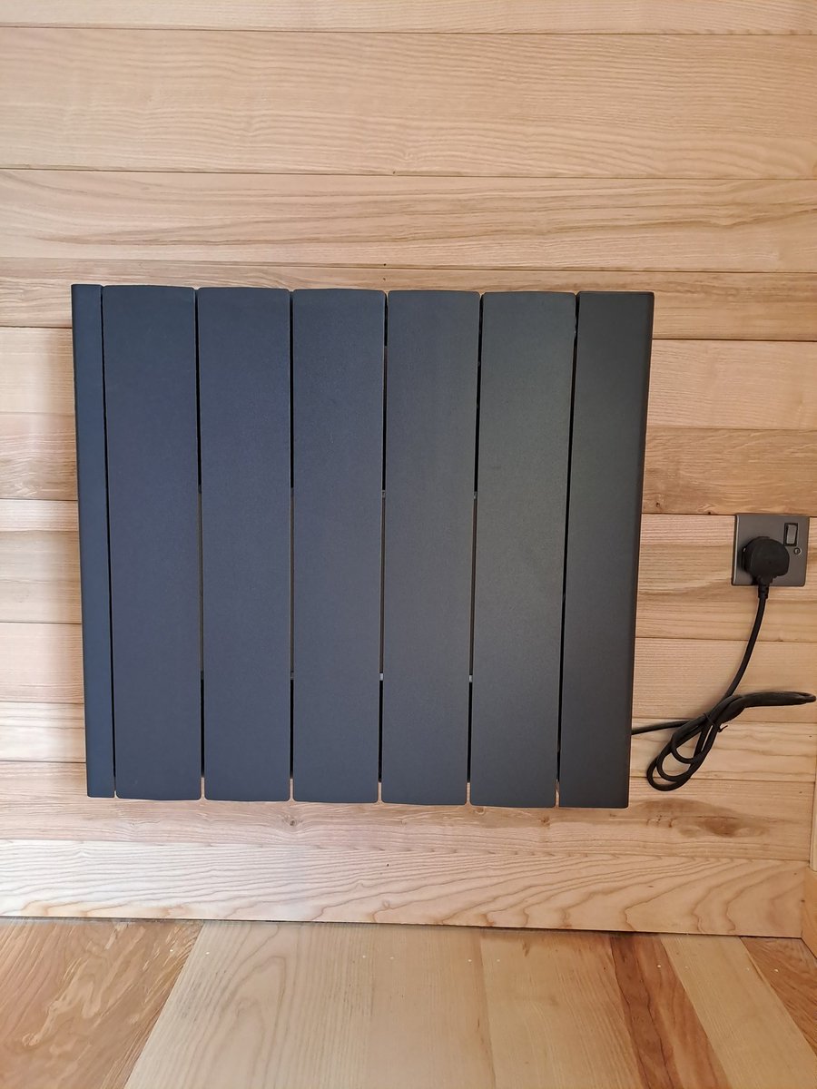 1. This is the only radiator in our house. We haven't turned it on yet, or used any other heating source. Yet we are always warm. Why? Because this house (which we rent) was built almost to passive house standards. Our bodies/cooking/appliances are sufficient to heat it. 🧵
