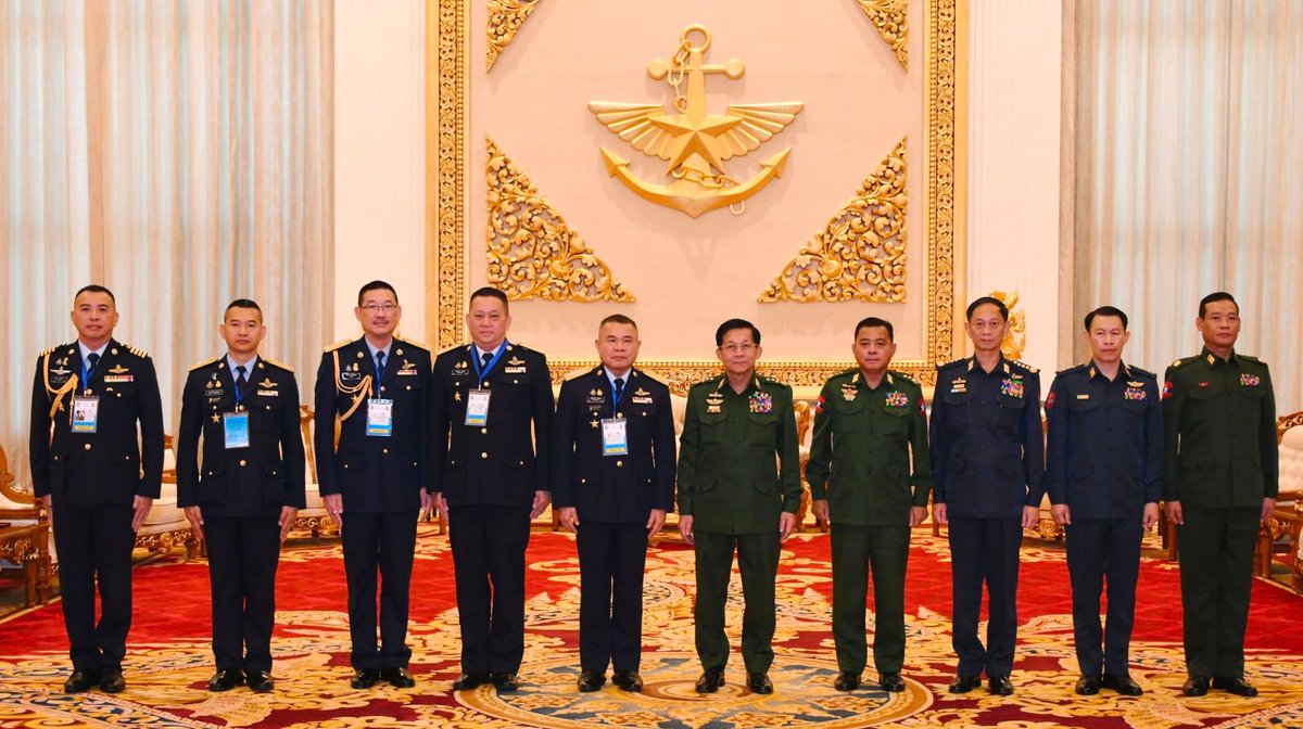 This handout photograph taken and released on November 23, 2023 by the #Myanmar Military Information Team shows Myanmar's military chief #MinAungHlaing (centre R) receiving Royal #Thai Air Force chief #PunpakdeePattanakul (centre L) and his delegation in #Naypyidaw.