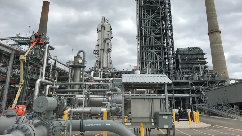 Equipment used to capture carbon dioxide emissions is seen in a 2017 photo at a coal-fired power plant in Thompsons, Texas.