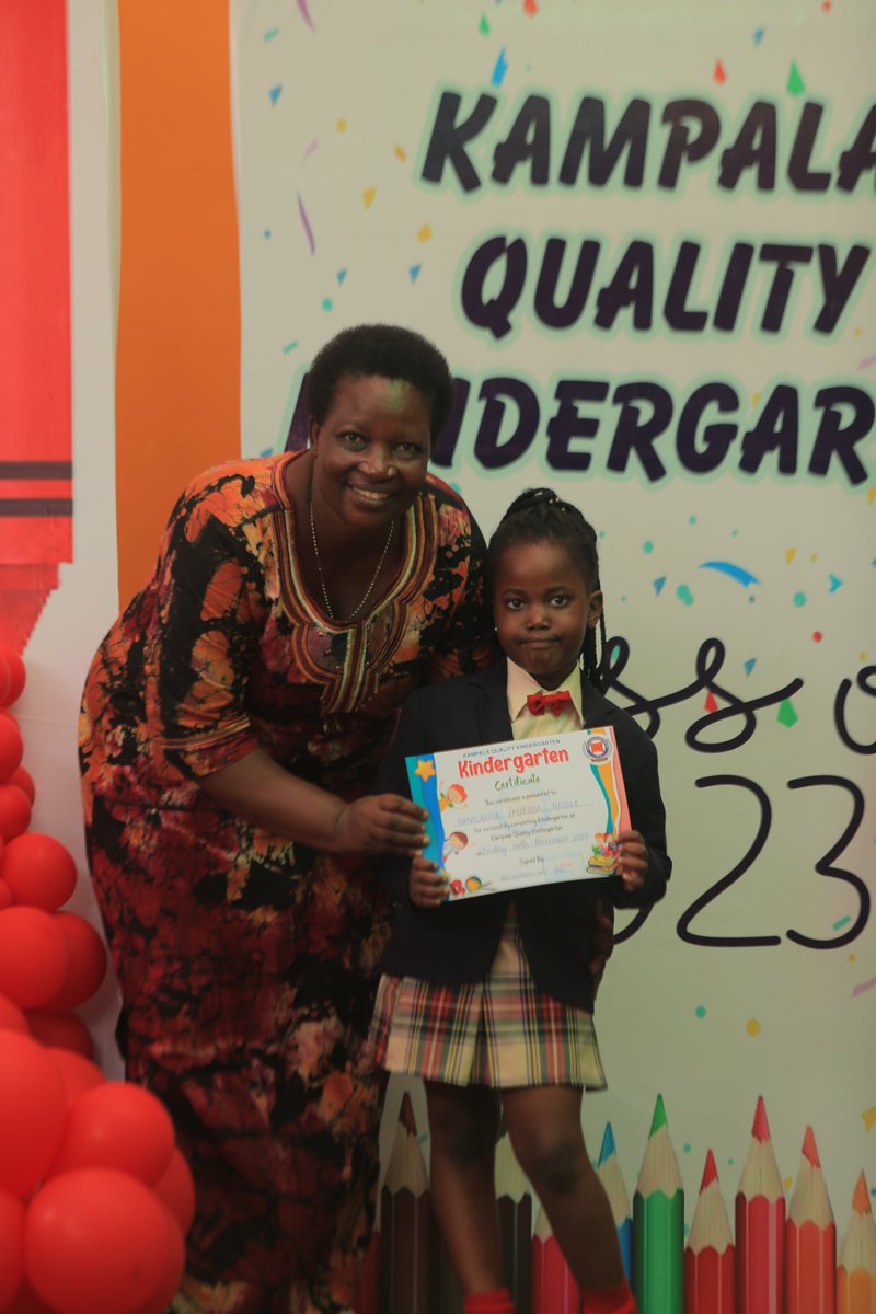 kqkindergarten's tweet photo. The headmistress Mrs. Basembeza hands over certificates of completion to some of the #topclass children at @kqkindergarten.🥲☺️ We wish you success as you progress to the next phase in your #education. #InvestInEducation #topclassgraduation https://t.co/YYJ5NAKQ9t