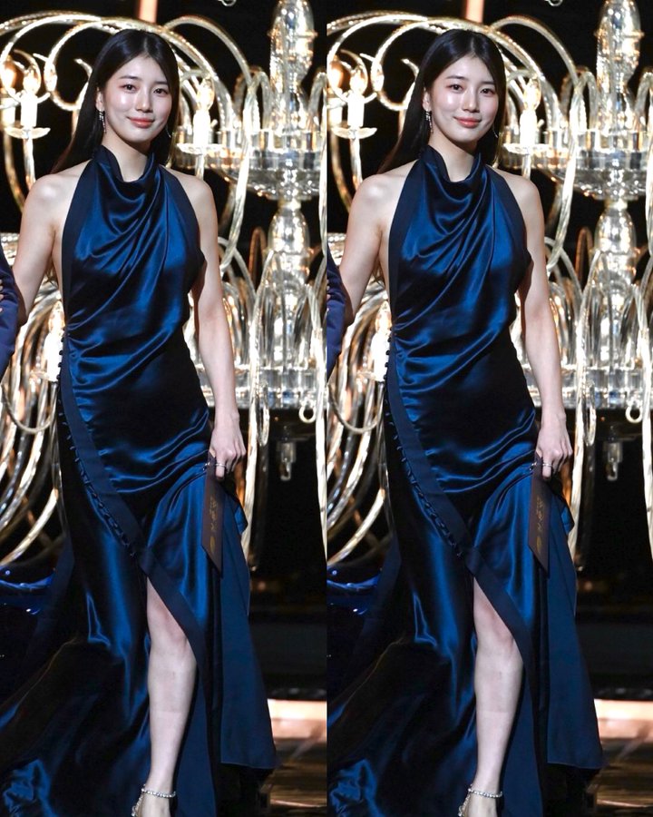 a slit and backless dress woah.