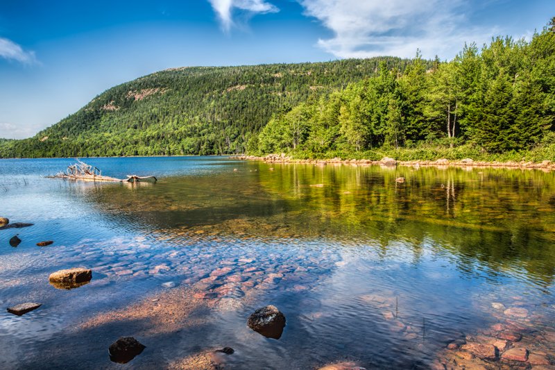 This is Jordan Pond in Acadia National Park, Maine. Acadia is the fifth smallest national park by land area but is among the top ten most visited. 

Jordan Pond by John M Bailey. pixels.com/featured/jorda…

#jordanpond #acadianationalpark #maine