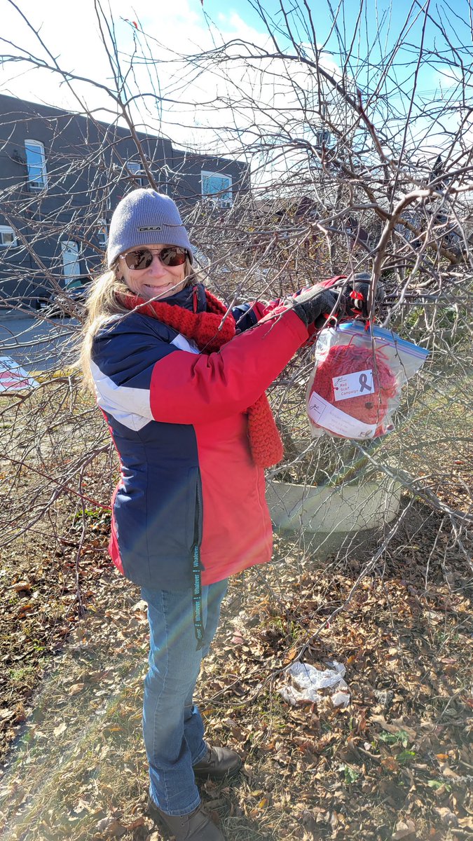 muskokapride's tweet photo. Community members, volunteers from #MuskokaPride, and Kellie from the @gilbertcentre tied red scarves to lampposts in downtown #Gravenhurst and #Huntsville today in recognition of #WorldAIDSDay on December 1st and #HIVawareness. Need a scarf? Take a scarf! #RedScarfCampaign https://t.co/pjkW84ez3z