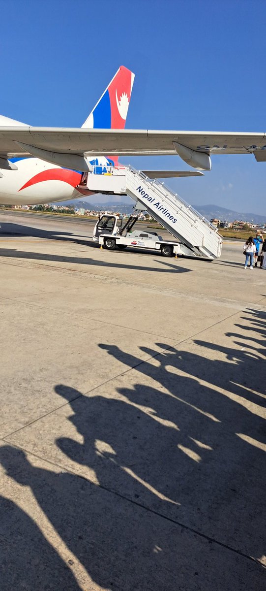 Why do you have to make passengers stand in line next to the plane, every time without letting them in straight from the bus? 
With a little bit of coordination, you can avoid this. 
#nepalairlines