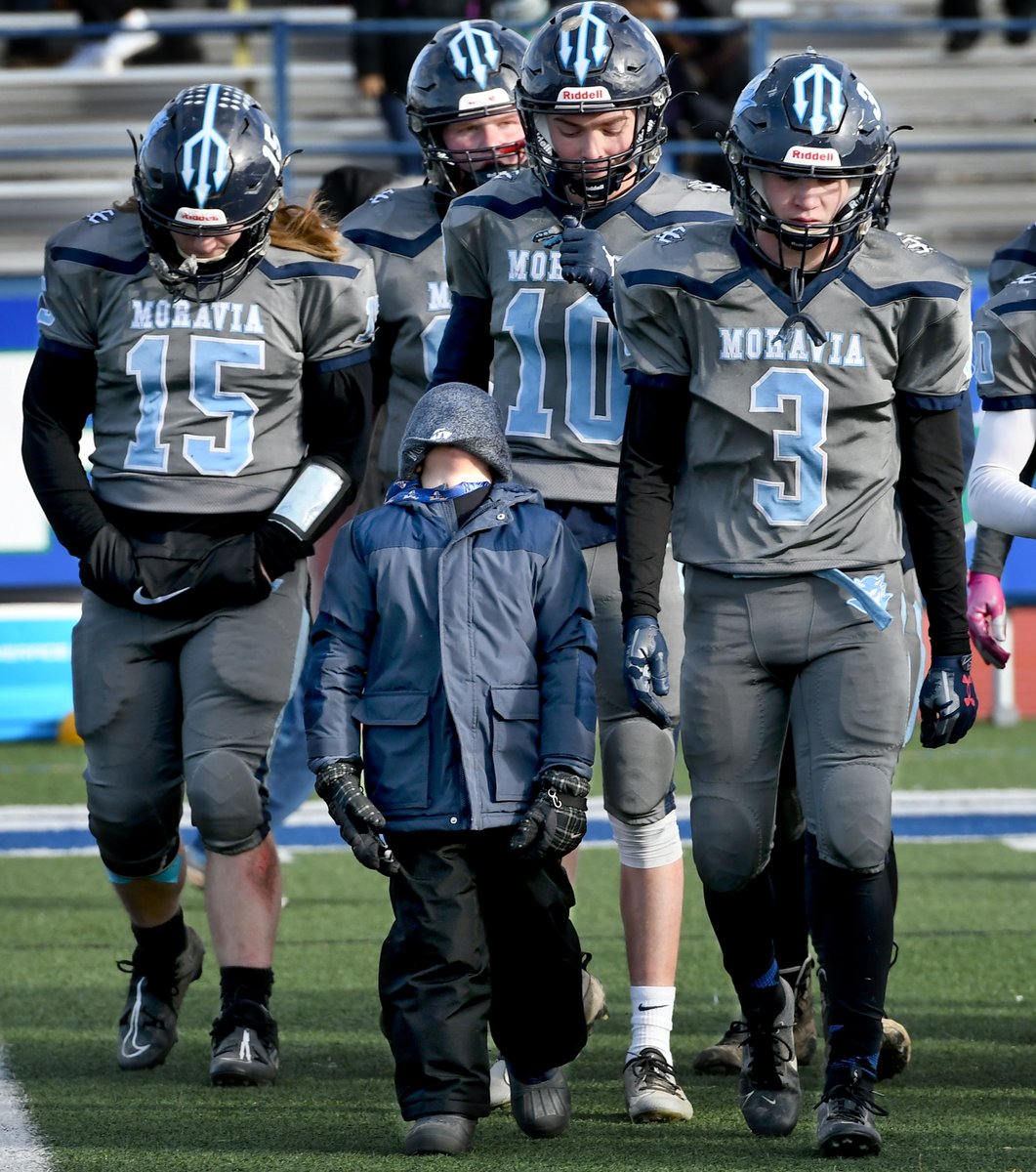 Moravia players and ball boy react after their miracle season comes to an end against Pembroke 36-0 in the NYSPHSAA 8-Man football regional championship game at Cicero-North Syracuse High School Friday. (Kevin Rivoli, The Citizen) Gallery: auburnpub.com/news/moravia-p…