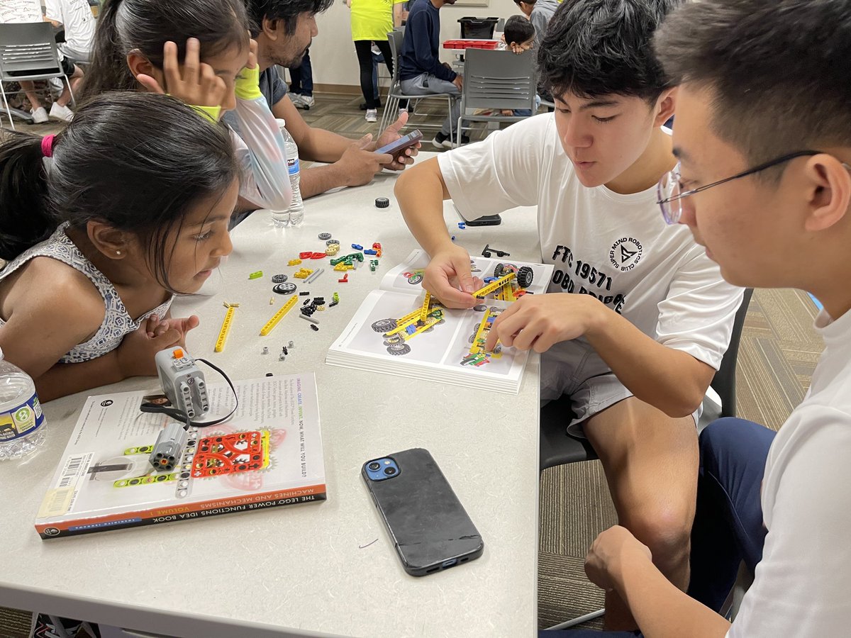 TheRoboBrigade's tweet photo. This past Saturday our team hosted a robotics workshop at Sandy Springs Library for kids. We guided the children through building lego robots and demonstrated our FTC robot! Our team had a lot of fun! https://t.co/0aFUUs1AV1
