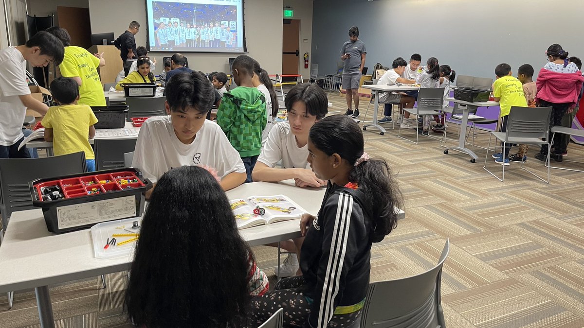 TheRoboBrigade's tweet photo. This past Saturday our team hosted a robotics workshop at Sandy Springs Library for kids. We guided the children through building lego robots and demonstrated our FTC robot! Our team had a lot of fun! https://t.co/0aFUUs1AV1