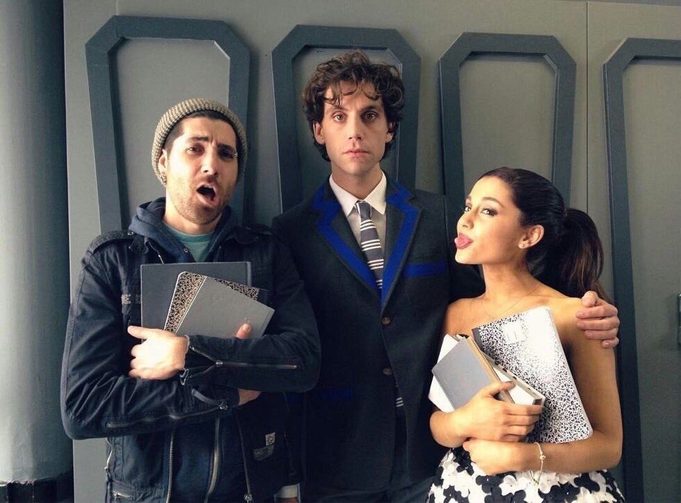 ArianaToday's tweet photo. mika praises ariana’s ‘superstar’ work ethic: “she arrived to film the [popular song] video, with her red hair, dyed it dark for the shoot and then when we finished at 1 am, she immediately dyed it back to red and flew back to continue filming” https://t.co/TB31m26oig