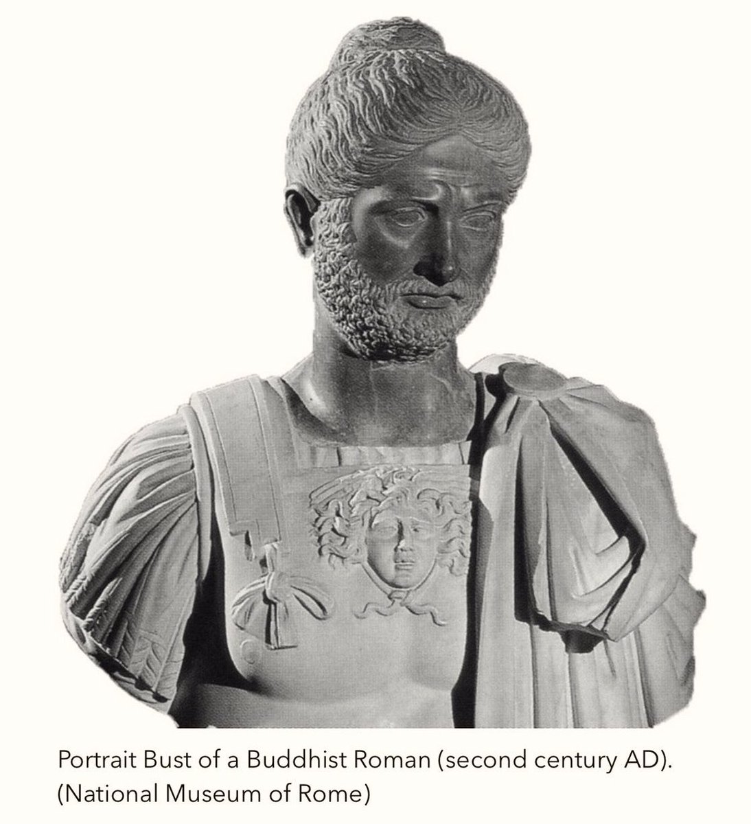 'Some of the Roman converts to Buddhism continued to practice their beliefs when they returned to the Empire. They are shown with long hair styled into a special cranial knot known as the ushnisha worn by Buddhist holy men to signify the attainment of spiritual knowledge.'