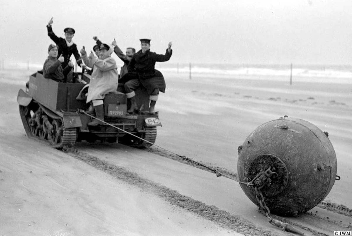 Having fun. 😊 (#OTD in 1941, Tayport beach. Members from the Mine Recovery and Disposal Squad towing a naval mine with the aid of a Bren gun carrier from Polish 1 Corps. #WW2 #HISTORY)