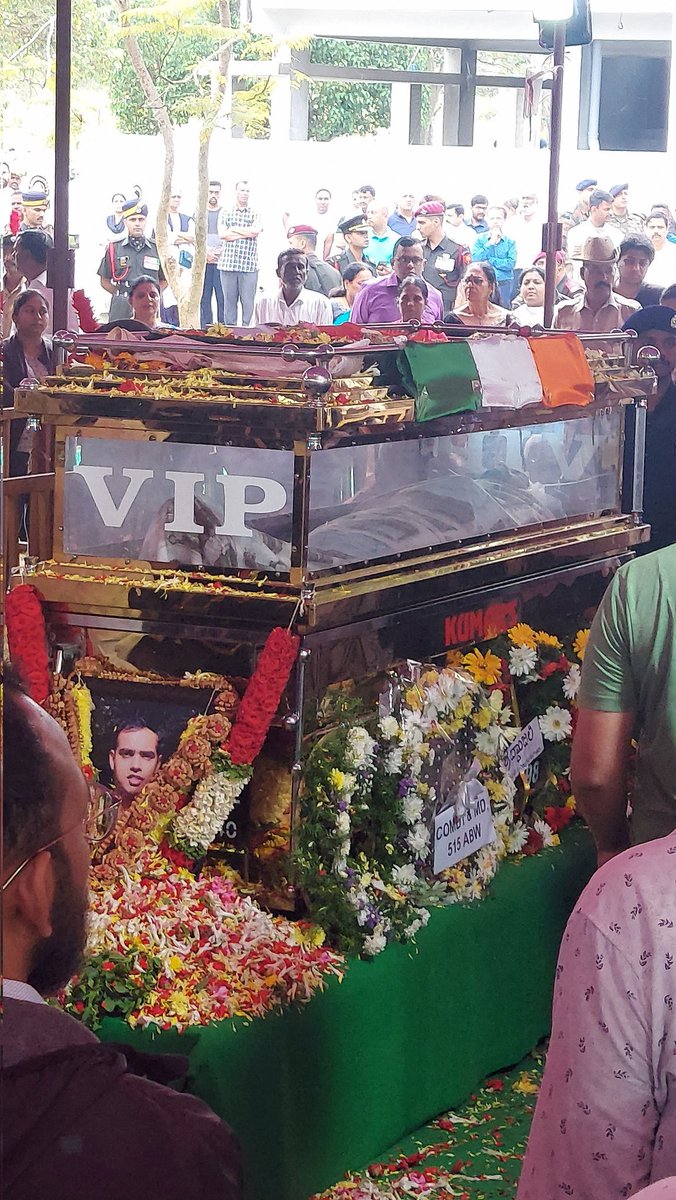 Final journey of Capt Pranjal 

The men of the family, friends, relatives, and locals joined in the 20-km journey from the house to crematorium. 

Throughout, the family kept their composure. 

Visitors decorated the glass casket with wreaths and garlands, cheering Amar Rahe.
