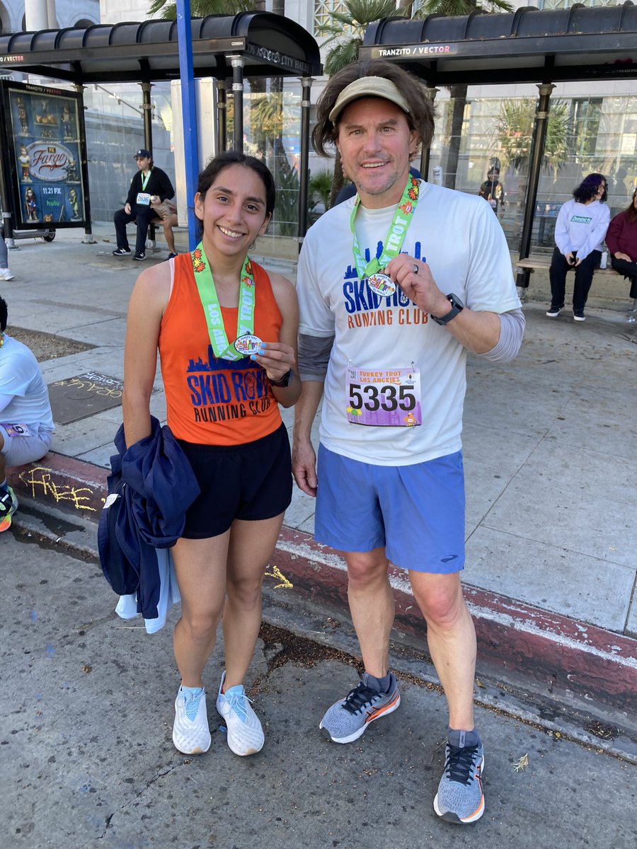 Skidrowrunclub's tweet photo. Turkey Trot!!! We had an awesome time running around DTLA for Thanksgiving. 50 SRRC members ran the annual @GenericEvents @TurkeyTrotLA. Two of our runners placed first in their divisions and one took 3rd place female overall! Thankful for our family, friends, and community! https://t.co/Fe8FhphGjO