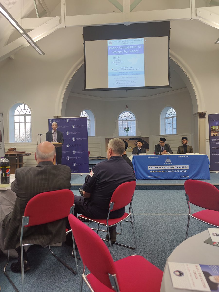 Mr. Robert Williamson reciting the poem "Crown of glory" at Ahmadiyya Muslim community 'voices of peace' event in Fife.