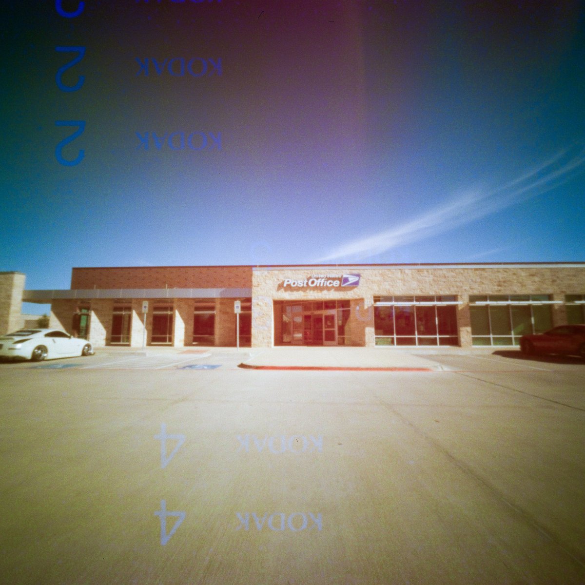 I'll be talking to @Warboyssnapper on @TheLensless Podcast about @HolgaWeek in just a few. It's always a good time catching up with Andrew and talking #pinholephotography. #Pinhole pics taken from Christmas 2022 shopping with my @ONDUpinhole 6x6 camera on Kodak film.