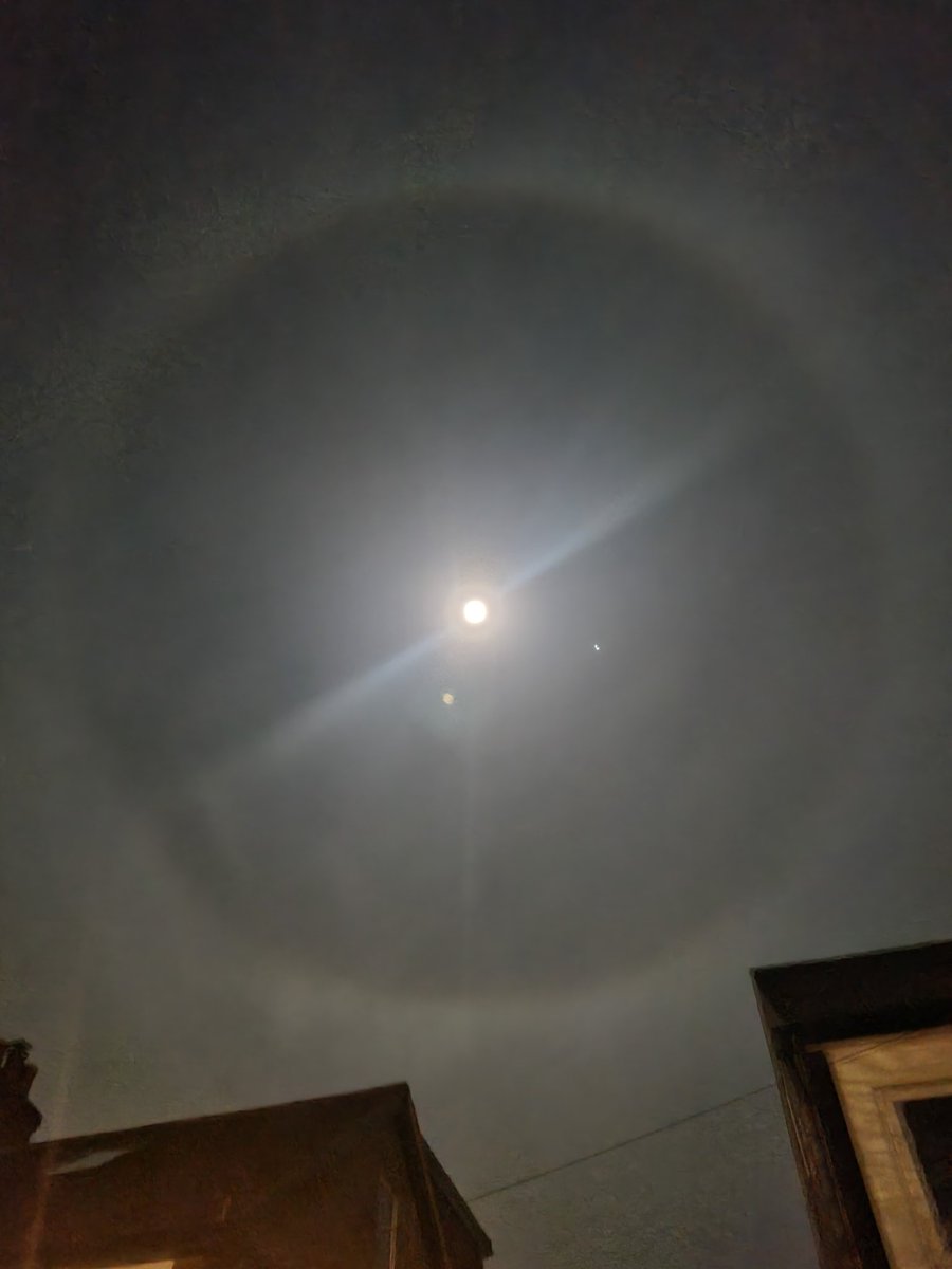 Beautiful moon and Jupiter, and a halo effect.  I've never seen anything like it, get outside and look now! #moon