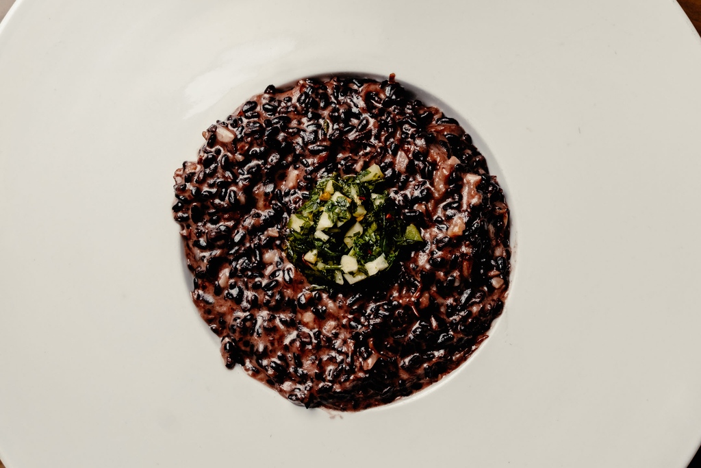 Our Black Rice & Oxtail Risotto with parmesan cream is the meal that wags your taste buds! 🐂⁠
⁠
#CarsonKitchen #DTLV #Vegas #SLC #SaltLakeCity #TailWaggingFlavors  #OxtailElegance #FoodieHeaven #TantalizingTastes