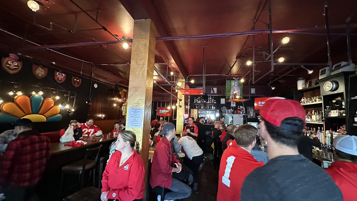 At a Buckeye watch party in the Mission. (Relatives.) The bright morning mood is darkening. I have no horse in the race. Send help. 

#TheGame #bignoon