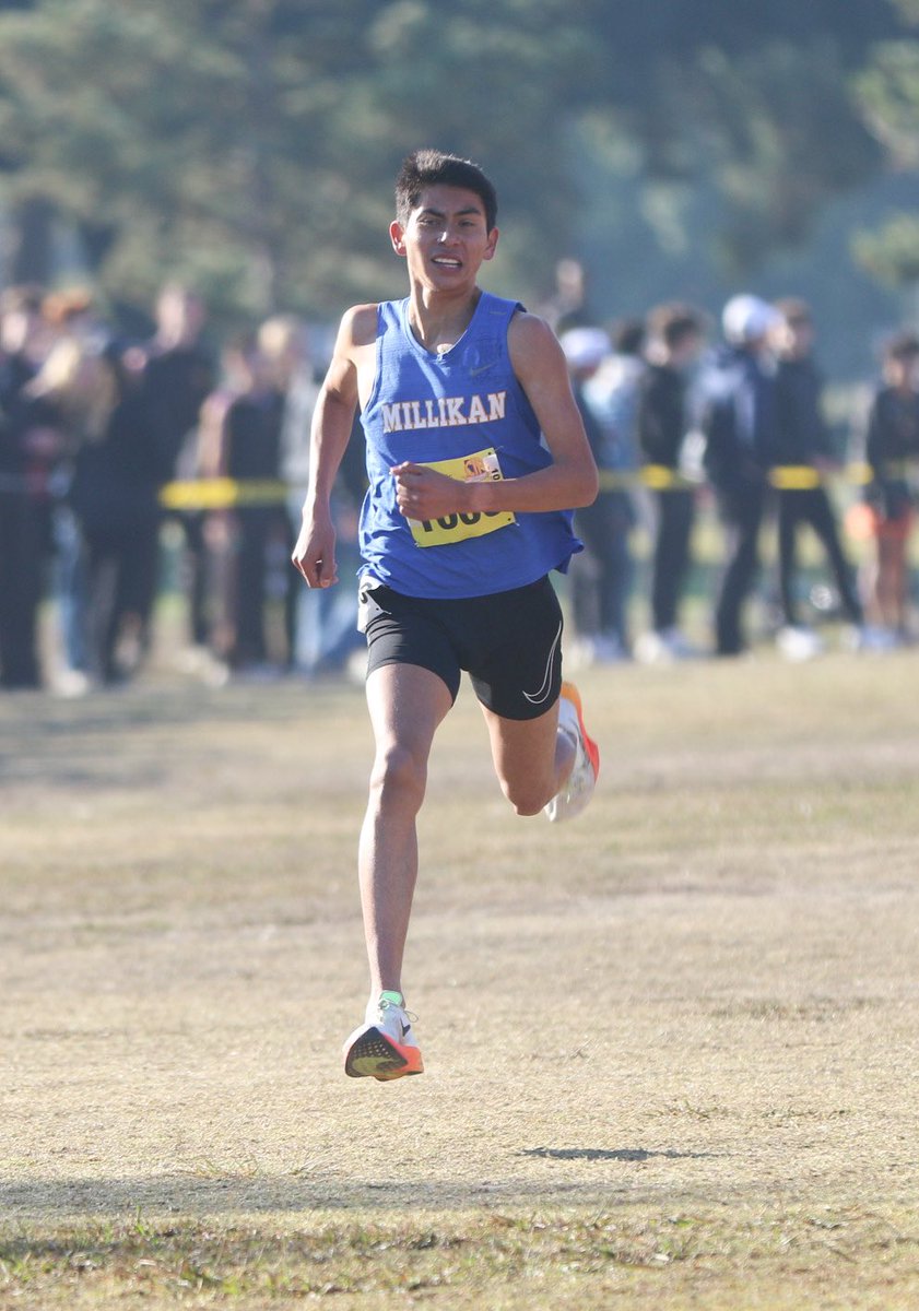 Jason Parra of Millikan wins the D1 California State Meet in a time of 14:56.8